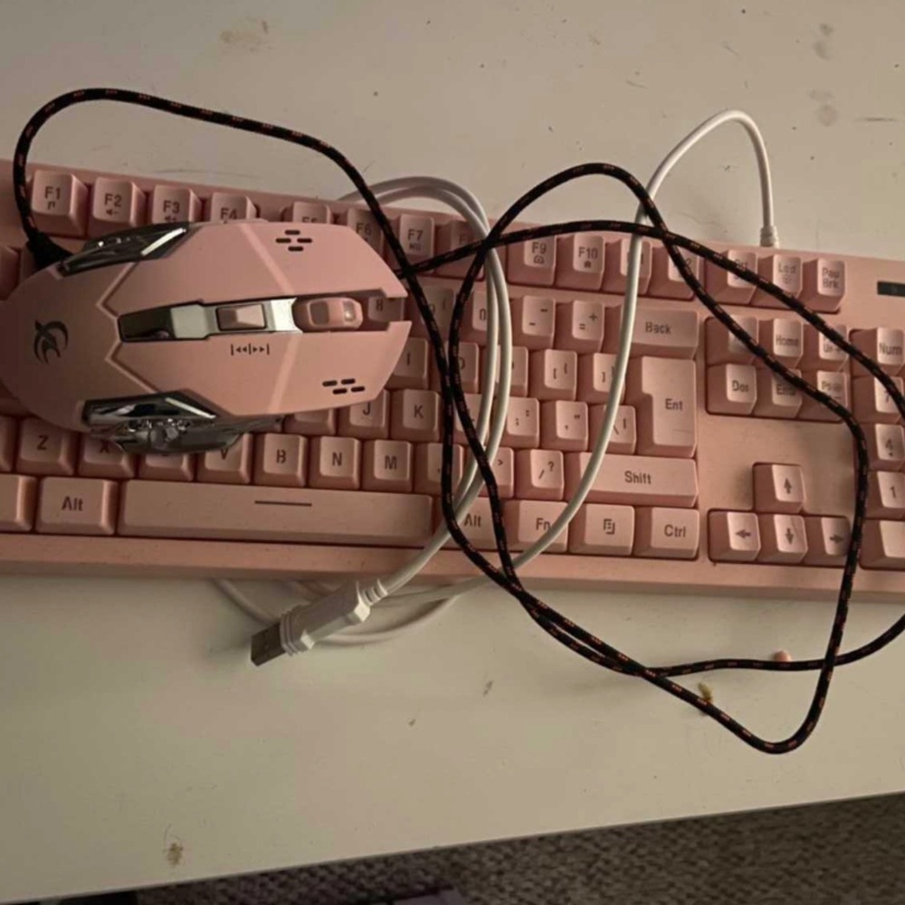 Pink gaming keyboard with mouse